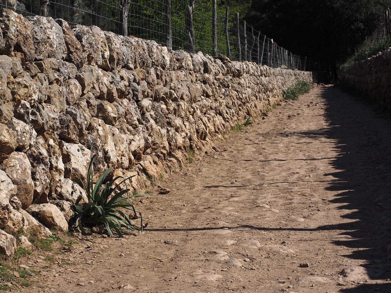 Stone wall, dirt road, path in Riverside, CA
